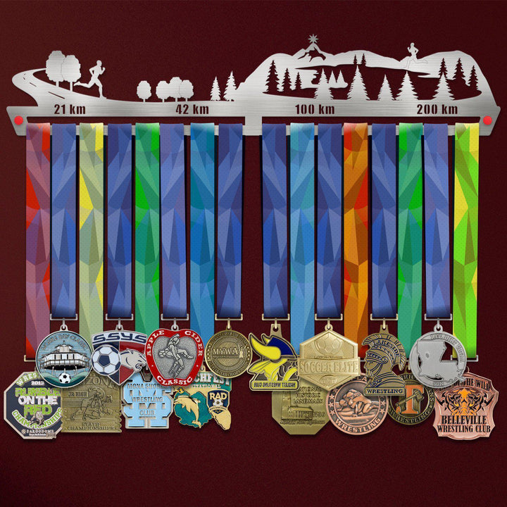 21KM 42KM 100KM 200KM Medal Hanger Display with colorful ribbons and various medals hanging on a stainless steel rack.