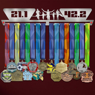 21.1 - 42.2 Medal Hanger Display showcasing colorful marathon medals on a stainless steel rack, ideal for runners' achievements.