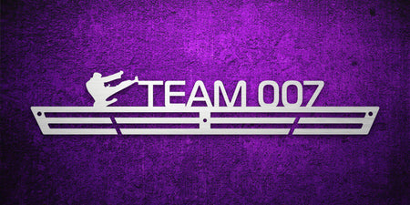 Custom images gallery martial arts medal rack with 'TEAM 007' and kicking silhouette, perfect for team sports medals.