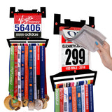Race Bib Holder + Medal Hanger Display Rack V2 by Victory Hangers® showcasing race bibs and medals with vinyl sleeves for organized display.