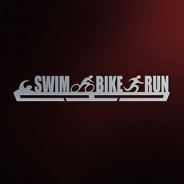 Swim Bike Run Medal Hanger Display V1 Triathlon Metal Rack in brushed stainless steel with swim, bike, and run icons on a dark red background.